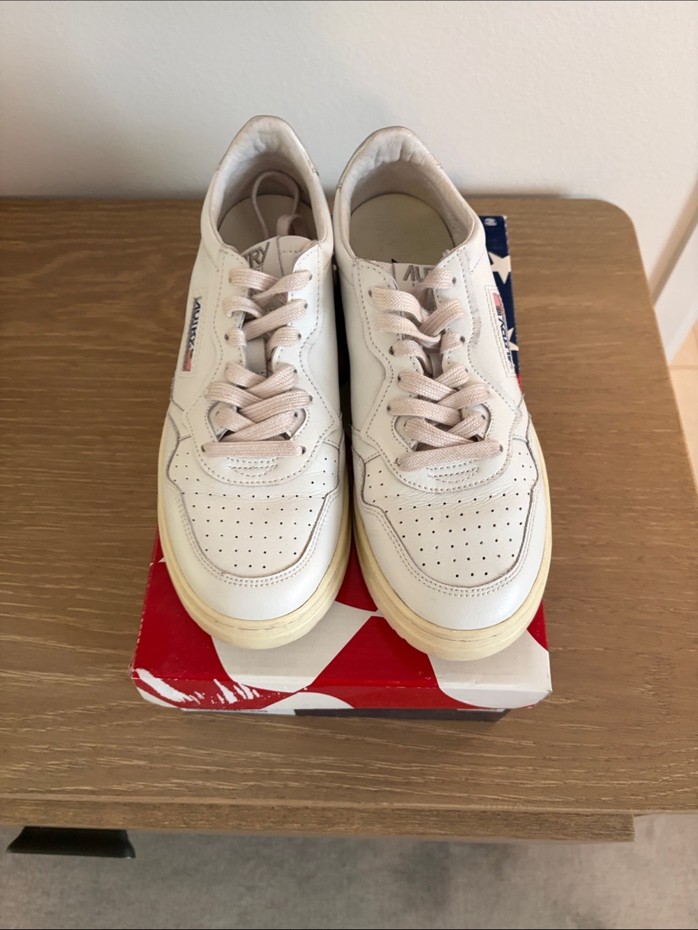Autry White Low-Top Leather Sneakers with silver detail